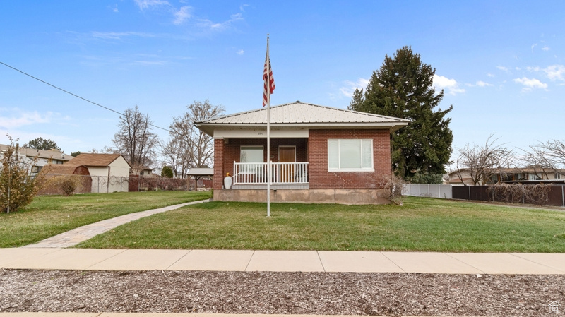 A Piece of Roy History  Lovingly Maintained & Worry-Free Since 1916!  Step into a beautifully preserved piece of Roy's history-a family-owned treasure since 1916! This immaculate full-brick rambler blends historic charm with modern updates for worry-free living, including updated plumbing, electrical, windows, and a durable metal roof. The custom kitchen is a true showstopper, featuring granite countertops, a copper farmhouse sink, a pot hanger, and timeless country charm.  Outside, you'll find a gorgeous pergola, a thriving peach tree, and Concord grapes, creating a serene backyard retreat. Lovely driveway takes you around back for plenty of parking and ease of access to the main road. The property also includes a historic milk shed and an amazing workshop with a 220 outlet, perfect for projects or storage. Inside, enjoy the classic clawfoot tub, elegant crown molding, all the architectural charm including tall floor boards, custom moldings and high ceilings.  With Roy's historical markers along 6000 S sharing even more of this home's story, this is your chance to own a worry-free, move-in-ready piece of local history. Come see it today!