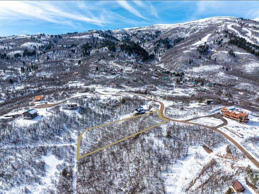 You will love this lot's breathtaking views of Pineview Reservoir and the surrounding mountains. Tucked away in a secluded neighborhood just minutes from Nordic Valley Ski Resort, this property is a must-see for anyone seeking the perfect balance of mountain solitude and investment potential. Perched on a gradual slope, this wooded parcel offers panoramic mountain, lake, and valley views with multiple hiking trailheads nearby.  Now is an extraordinary time to buy in this community as the Nordic Valley Master Plan begins to take shape. This long-term vision for the resort is already driving significant infrastructure improvements and enhancing year-round amenities, positioning the area for steady appreciation. By securing one of the last remaining lots now, you are getting in ahead of these regional enhancements while still enjoying the peace and privacy that makes this specific neighborhood so special.  Whether you are building your dream primary residence or a legacy second home, this property offers a rare chance to capitalize on the valley's growth without sacrificing the quiet mountain lifestyle. A Perc Test was completed in 2014 and passed, and utilities including power and gas are available in the street. Culinary water can be supplied through Nordic Mountain Water. All property information to be verified by buyer.