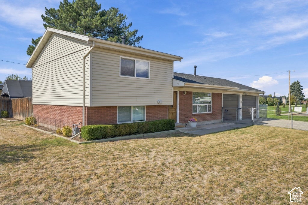 Photo of 3898 S BONNIEWOOD DR, West Valley City, UT 84119 (MLS # 2190240)
