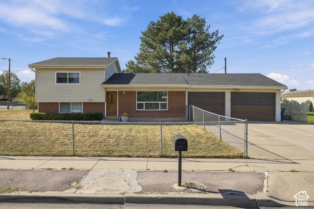 Photo of 3898 S BONNIEWOOD DR, West Valley City, UT 84119 (MLS # 2190240)