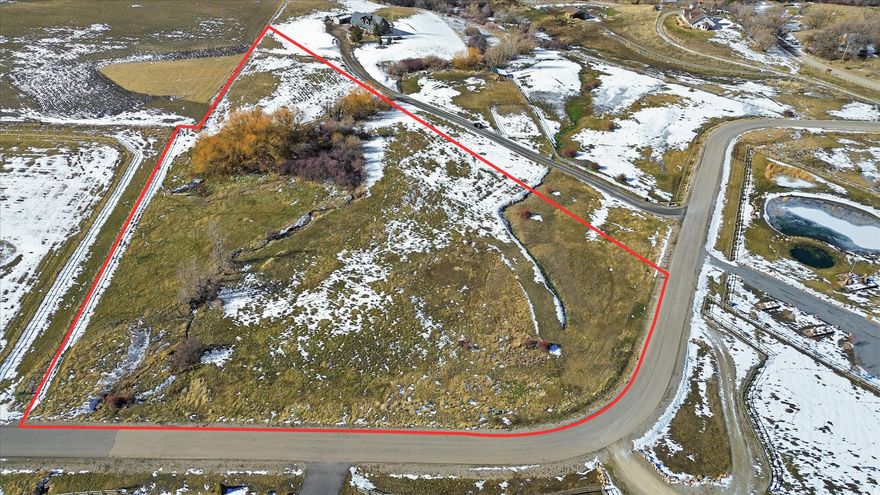 Tucked inside the coveted Maple Creek Ranch subdivision, this 6.46-acre building lot is where wide-open space meets everyday serenity. With access to an indoor/outdoor equestrian riding arena and National Forest land just minutes away, it's a dream setting for animal lovers, outdoor enthusiasts, or anyone craving a quieter pace of life. located about 35 minutes from Logan, Utah and 20 minutes from Preston Idaho. Come check out this stunning lot! power and water is stubbed. HOA is in negotiations.  lot lines are approximate. information deemed reliable, buyer to verify all.