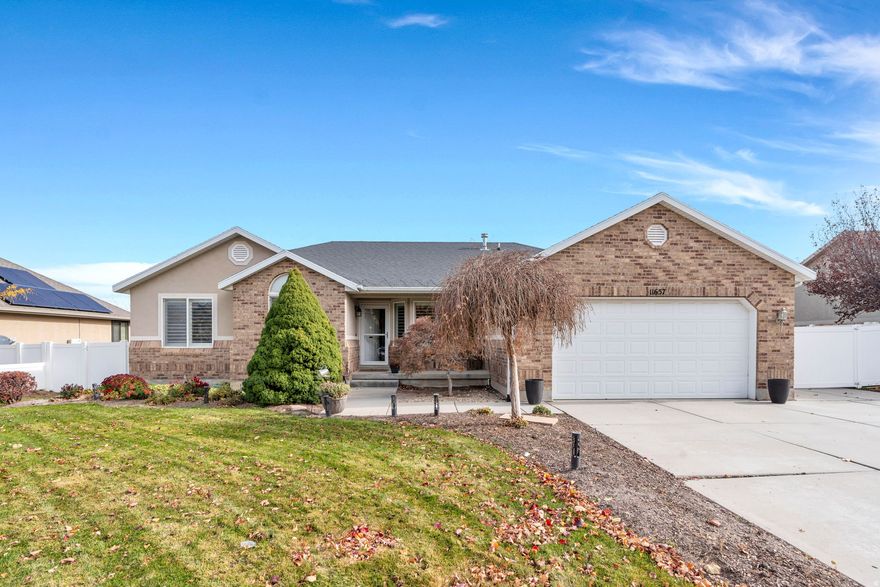 Welcome home to this charming rambler featuring 5 bedrooms, a 2-car garage, and a beautifully updated kitchen with stainless steel appliances, a pantry, and a corner sink. Enjoy bar seating at the peninsula and plenty of space for gatherings. The fenced yard and downstairs kitchenette add extra convenience and flexibility!  Square footage figures are provided as a courtesy estimate only and were obtained from county records .  Buyer is advised to obtain an independent measurement.