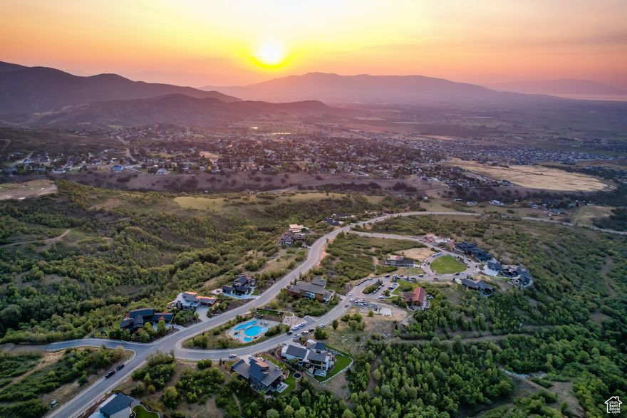 Welcome to one of Summit Creek's most promising homesites - a gently sloping lot with commanding mountain and valley views, soon to be made even better with the scheduled removal of an on-lot power pole and line. It's a rare chance to create something timeless in a setting designed for luxury.  Wake up to golden morning light streaming over rugged peaks. Spend evenings soaking in mountain sunsets from your living room or private terrace. With the lot's natural terrain, the possibilities are endless - whether you're dreaming of expansive glass walls, tiered decks, or seamless indoor-outdoor flow.  This isn't just a lot; it's your foundation for a custom home that reflects both vision and lifestyle. Every square foot invites creativity - with ample space for privacy, comfort, and design that makes the most of the view.  As part of the renowned Summit Creek community, you'll enjoy access to refined amenities: a resort-style clubhouse perfect for private events, fitness facilities, relaxing pools, hot tub, and miles of scenic trails for hiking, biking, and exploring.  Here, nature and luxury live in harmony - and now, you can too. Learn more at SummitCreekUtah.com. Build with one of our trusted professionals or bring your own. Your next chapter begins on this land. Google Maps Pin: https://maps.app.goo.gl/pJwucUGaUqKXQmE86