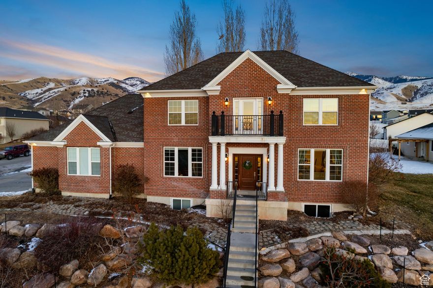 Sellers are motivated to move on to their next adventure.  Experience unparalleled luxury and breathtaking 360 views in this stunning 5-bedroom, 3.5-bathroom residence.  Immerse yourself in panoramic vistas that stretch as far as the eye can see, creating an unforgettable living experience. Inside, discover a world of refined elegance, where premium cabinets and countertops, a coffered kitchen ceiling with 12" crown molding, and designer lighting create an atmosphere of sophisticated comfort.  The fresh feel of new paint and plush carpeting complements the striking marble floors, while premium trim and thoughtful details elevate the entire home. The gourmet kitchen is a chef's dream, featuring a gas range and double oven. Entertain in style with Doric columns on the main level and a cozy gas fireplace. The huge master bedroom is a true retreat, complete with a walk-in shower, jetted tub, and a spacious layout that offers ample room for relaxation and personalization. Practical updates include two laundry rooms and added storage above the garage. Outside, discover raised garden beds, a charming cottage garden, and striking facade outdoor lighting.