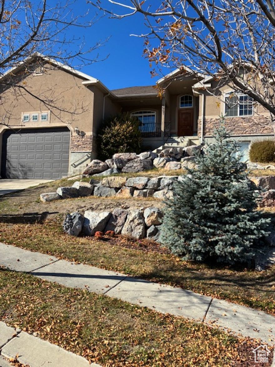 Great large home in Eagle Mountain. Perfect for family living with five bedrooms and three baths. Open floor plan both upstairs and downstairs for family parties. Wonderful views of the mountains and lake. THIS IS A SHORT SALE.