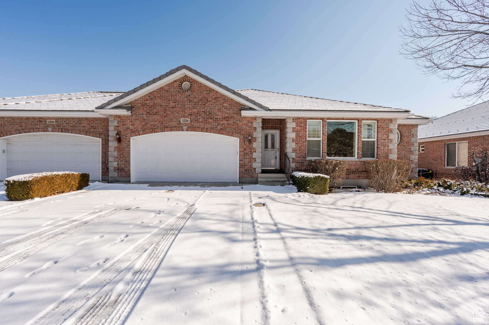 Inviting Brick Rambler in Exclusive 55+ Community!  This beautifully maintained, one-owner home is a rare find in a quiet neighborhood of high-end properties, offering unmatched quality and sophistication. Located next to Fox Hollow Golf Course with stunning mountain views, the home combines elegance and comfort. The main level features a grand entry with picture windows overlooking the lush backyard, radiant heated floors, vaulted ceilings, and plantation shutters. A spacious owner's suite, secondary ensuite, powder bathroom, laundry room, and an open-concept kitchen, dining room, and great room make this level ideal for living and entertaining.  The fully finished basement offers a large gathering room, a wet bar, two additional bedrooms, a full bathroom, and abundant storage space.  Home speaker system, central vacuum, granite countertops, knotty alder cabinetry, built-ins throughout, and two laundry rooms (main level with gas dryer hookup, basement with electric). The meticulously landscaped yard is taken care of for you and adds to the home's charm. Schedule your private showing today, this home won't last!  Square footage figures are provided as a courtesy estimate only. Buyer is advised to obtain an independent measurement.