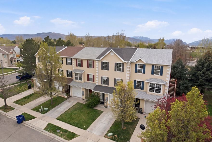 This inviting 4-bedroom, 2-bath townhouse in Heber offers the perfect mix of modern updates, comfort, and mountain-town charm. The home features a fully updated kitchen with stylish finishes, upgraded lighting throughout, and beautifully refreshed bathrooms. A cleverly designed coffee and appliance station adds a unique touch, making everyday living both convenient and enjoyable. Great views of the Timpanogos nestled in a quiet neighborhood, this property includes a one-car garage.  Its prime location provides easy access to the endless outdoor recreation that Heber Valley is known for-from hiking and biking to skiing and fishing. Step outside to your private backyard, an ideal space to relax and unwind after a day of adventure. Whether you're enjoying the fresh mountain air or taking in the peaceful surroundings, this outdoor area adds an extra layer of livability to the home. Perfect as a primary residence or a getaway retreat, this townhouse combines thoughtful upgrades, scenic beauty, and a highly desirable location.