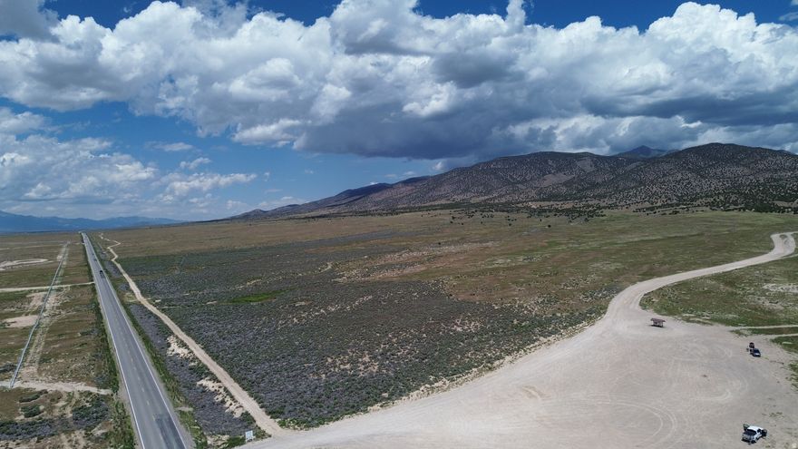686 scenic acres on the east bench of Rush Valley, Tooele County, UT. Zoned MG (Manufacturing Gen) & MU-40 (Multiple Use-40 acre min) in unincorporated Tooele County (area known for zoning & use flexibility). Large land offering with unique accessibility to SL & UT Counties  Rare ingress/egress from two established access points along SR-73. Located in Utah Water Right Area 15 SE - still open to new water right appropriation for 1 EDU (dwelling) & 10 ELU (livestock). North of Fivemile Pass Rec Area & West of Ford Performance School. Open range land and beautiful foothills overlooking Rush Valley. Property has historically been grazed for sheep (no fencing). Land is a mix of natural grasses, sage brush, and cedar trees. Parcels 06-080-0-0004, -0013, & portions of -0012 & 06-083-0-0005.  18 miles south of Tooele, 20 miles west of Lehi, Utah. 35 miles southwest of Salt Lake City, Utah.