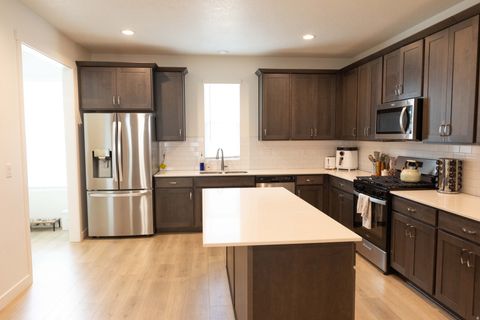 Photo of 638 N AUTUMN ASH CIR #9, Kaysville, UT 84037 (MLS # 2150980)