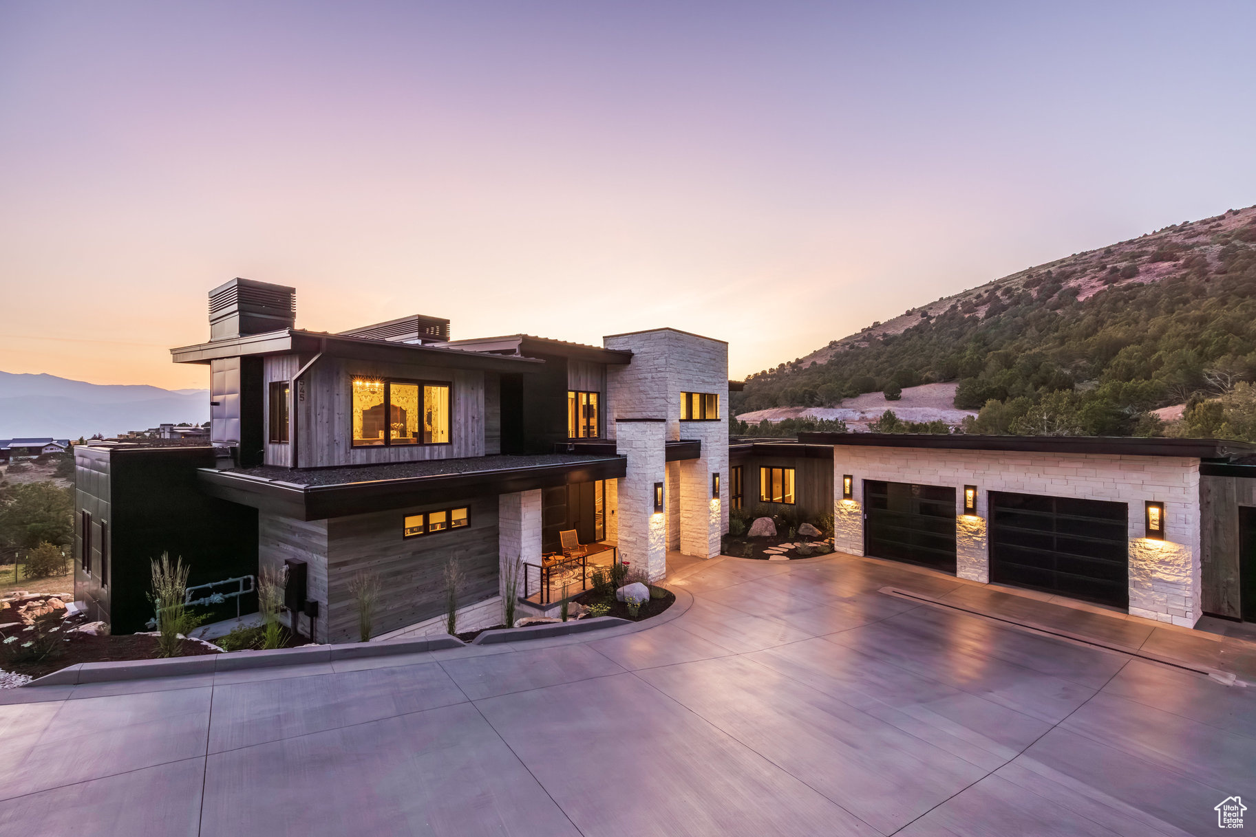 This carefully curated home in the Red Ledges golf community was designed to appreciate every angle of an outrageous view, including Mt Timpanogos, Deer Creek Reservoir and the Heber Valley, and even the Deer Valley East Village expansion, 10 minutes away. Six Covered Decks, 4 Patios, 1 Porch. 9 bedrooms total including two Bunk Rooms, each with en suite bathrooms and built-in closet systems. Six indoor and two outdoor fireplaces. Putting and chipping greens. Whole house radiant heat, three zone Air Conditioning, heated driveway, elevator. Montecello-inspired Wine Cave; Eagle's Nest Bourbon Lounge; a Living Room with 20' ceilings and a walkout Great Room, both with a wall of disappearing sliding glass door panels; one Kitchen with La Cornue induction range and Subzero fridge/freezer suite and Butler's Pantry with smoke blue cabinetry and antique arch-top door and Wet Bar with integrated marble sink; the walkout Kitchen with Viking induction range and custom bell curve range hood; a 3- sided glass wall Dining Room; a main level Laundry and a walkout level Laundry and Craft Room. The Primary Bedroom with deck, indoor and outdoor fireplaces, bath suite with walk-in steam shower, walk-in closet with built-in system and handbag closet. Three-story floating staircase. Exquisite marble, limestone, oak, brass and glass accents throughout. This home was crafted with meticulous care and designed for a legacy.