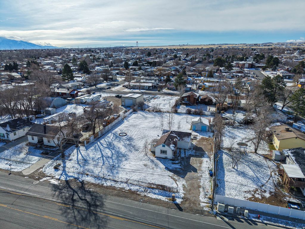 Photo of 7015 W 3500 S, West Valley City, UT 84128 (MLS # 2138371)