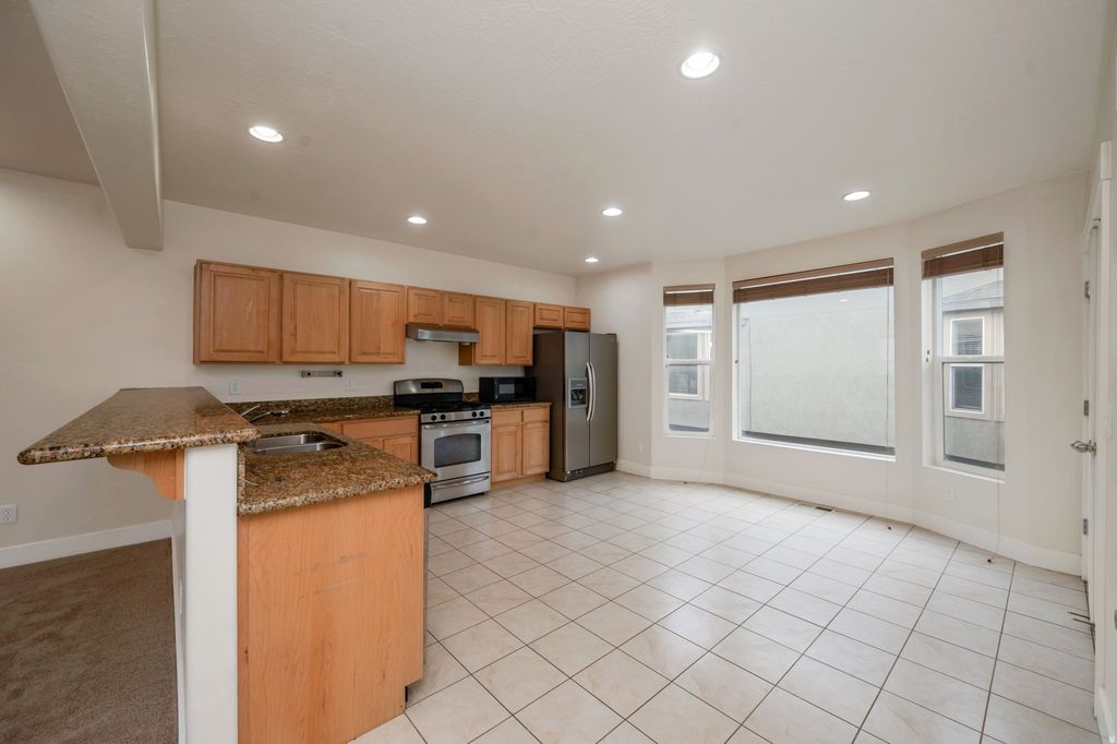 Photo of 3729 LUCHARS LN, South Salt Lake, UT 84115 (MLS # 2126570)