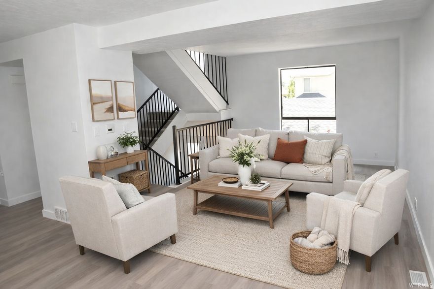 Updated townhouse featuring a rentable basement apartment/ADU with separate entrance, conveniently located in the center of Provo city, close to freeway access, schools, and parks. Vaulted ceilings and plenty of natural light throughout, making it a comfortable and cozy home.