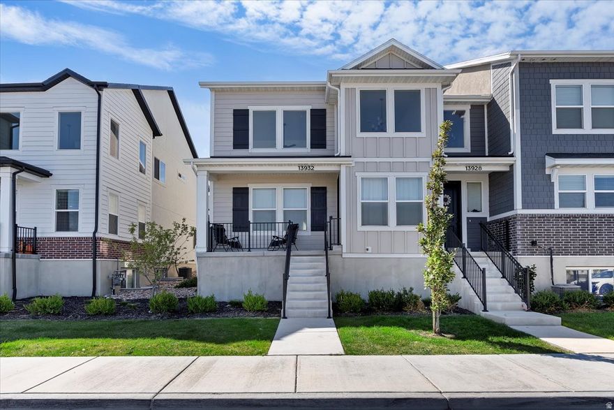 This bright and spacious end-unit townhome offers an open layout, large windows, and beautiful mountain views. The kitchen features quartz countertops, stainless steel appliances, and a large island. Upstairs includes a luxurious primary suite with a walk-in closet and double vanity. Enjoy a spacious patio, attached 2-car garage, and access to community amenities like a pool, clubhouse, and playgrounds. Prime Herriman location near shopping, schools, and Mountain View Corridor.