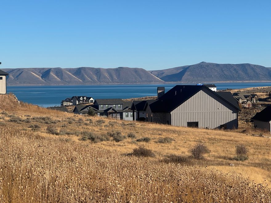 Build your dream home in the exclusive, gated community of The Reserve at Bear Lake. This exceptional lot is fully improved with paved roads and utilities ready to go, including power, water, and sewer stubbed to the property. Ideally located for year-round recreation, you'll enjoy direct access to Fish Haven Canyon for snowmobiling, snowshoeing, hiking, mountain biking, and exploring the extensive ATV/UTV trail system. As an owner in The Reserve, you'll have access to premier amenities, including a beautiful clubhouse with a fitness room, two heated seasonal pools, a year-round hot tub, splash pad, poolside pavilion, basketball, tennis, and pickleball courts, a playground, and gated beach access to the sparkling waters of Bear Lake. This is an incredible opportunity to own a piece of paradise in one of the area's most sought-after communities.