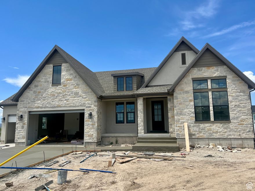 LOT #74 . Expected to be complete July 2025 The "Treble XL" is a highly sought-after floor plan and one of the last opportunities to own in this beautiful neighborhood! Featuring a new "European Romantic" exterior and countless upgrades, this home offers an open kitchen/family room with custom beams and Z-line appliances. The luxurious primary suite includes a custom closet system, and the finished basement is perfect for entertaining with a stunning wet bar. 3rd stall of garage is 43' deep! Ample storage, a large covered deck, and exceptional craftsmanship throughout. The community also boasts a swimming pool. Price includes full landscaping.