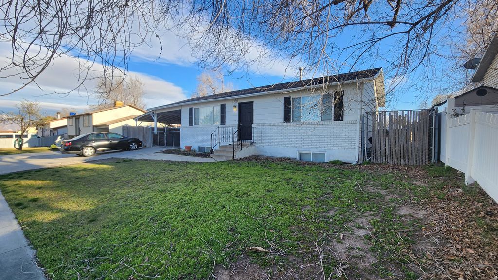 Photo of 4905 W HELLAS DR S, West Valley City, UT 84120 (MLS # 2143671)