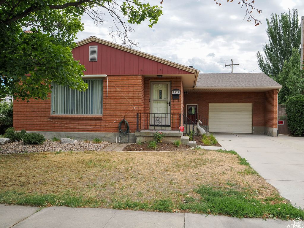 Photo of 7471 S SPRUCE ST, Midvale, UT 84047 (MLS # 2115174)