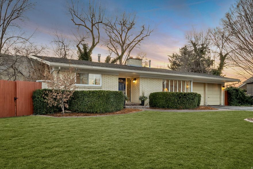 OPEN HOUSE Saturday, January 31st 12-2 pm. Free DONUT TRUCK! Welcome Home to this charming single level home with full basement in the heart of Holladay. This home has everything one is looking for in this prestigious neighborhood. A large beautifully landscaped yard, charm and character and many beautiful finishes and updates. Enjoy the location and proximity to the Cottonwood Country Club, Highland Drive, I-215, the various Canyons for skiing and outdoor adventure and easy access to Parley's Canyon providing access to Park City as well as Salt Lake and beyond. Enjoy the gorgeous remodeled and updated Kitchen complete with quartz countertops, double ovens, an expansive island, farmhouse sink, gas cooktop and more. Enjoy the cozy two sided gas fireplace and nearby Family Room and formal Living Room. Spacious Owner's Suite and bathroom with his and hers closets. An additional bedroom and full updated bathroom also found on the main floor. Downstairs you will be impressed by the 3 bedrooms and bathroom as well as a cozy family room/gathering space with beautiful built in bookcases and a fireplace. Enjoy the large basement storage room as well. Head outside to enjoy the mature landscaping, waterfall and pond, stone back wall, 2 story playhouse and idyllic and spacious covered patio space. This home has it all and you won't want to wait to make it your own.