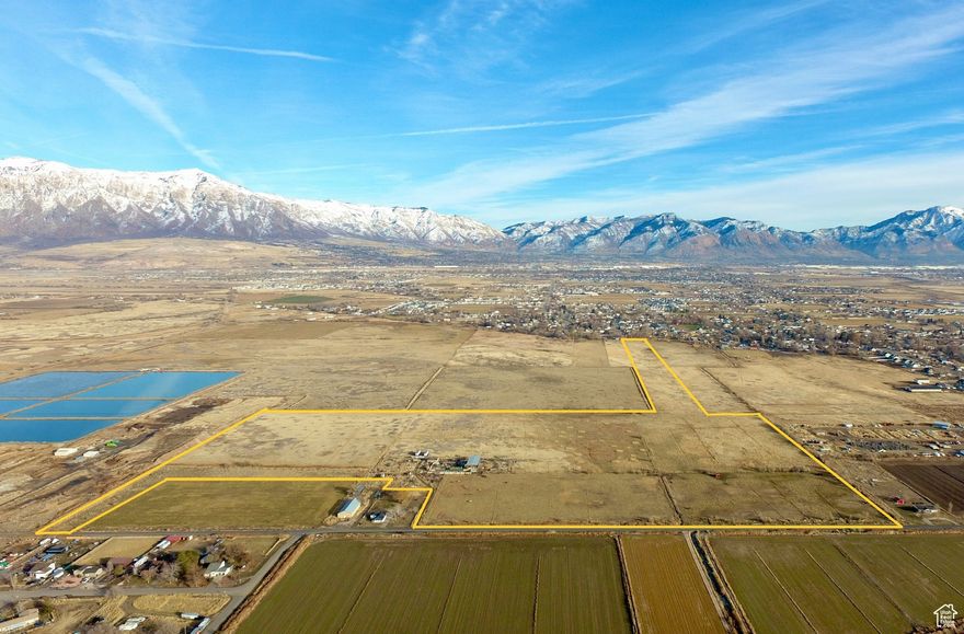 Prime large development opportunity in beautiful Plain City. Over 80 acres of virgin farm land, with water. Zoning change would allow for 18,500 s/f residential lots. Everything needed to develop is here, including water. Listing includes all of the following parcels: Tax ID 19-031-0006, 19-03-0005, 19-03-0006, 19-03-0008, 19-027-0026, 19-027- 0024 Boundaries in aerial views are approximate to property boundaries.