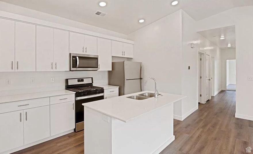 Stunning modern condo w/ open layout, tall ceilings, oversized windows, white cabinetry, stainless steel appliances, Quartz countertops throughout, smarthome, private deck & 1-car garage. Sq. footage per tax data records; Buyer to verify all information. Square footage figures are provided as a courtesy estimate only and were obtained from county. Buyer is advised to obtain an independent measurement. Great for 1031 Exchange