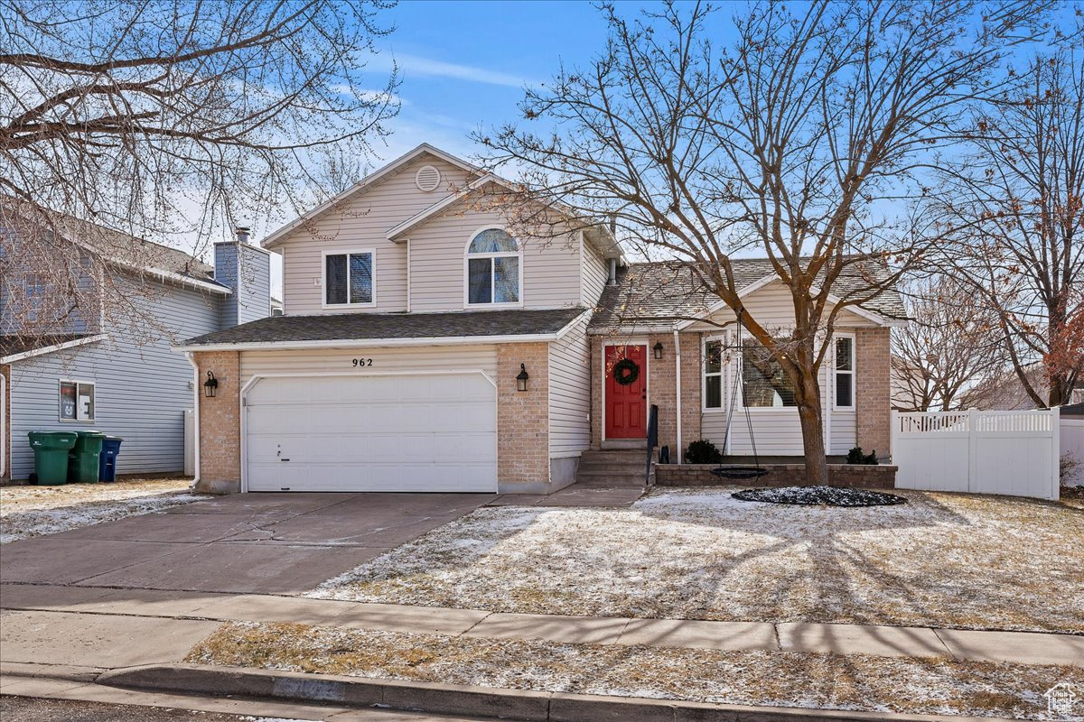 Ready for your new house?! This tastefully updated house has so many updates that it's hard to list. Here are some of those updates: new kitchen cabinets with quartz countertops in 2023, new windows in 2019, rebuilt fireplace in family room, updated lighting throughout, fully automatic sprinkler system, drip sprinklers in flower beds and garden boxes, water softener, updated laundry room, updated bathrooms primary ensuite with quartz counters and guest bathroom with cultured marble counters, tiled floors, and tiled shower surrounds. You will not be disappointed, it looks better in person than the photos look.  Enjoy strawberries, raspberries, apple tree, garden box, oversized sandbox, and covered deck in the backyard. The projector, screen, and speakers stay with the house. Utopia internet is available. Schedule a tour today!