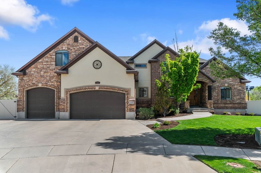 Protected Wasatch Front views on a quiet double cul-de-sac-this 5,146 sq ft home offers space, privacy, and a rare combination of features. Situated on 0.47 acres, the property provides room to live, entertain, and enjoy.  The outdoor space stands out with a private pickleball court, RV parking, and a 4-car garage-offering exceptional flexibility for recreation and storage. The backyard is designed for relaxation, featuring a firepit, hot tub, and sauna. Permanent holiday lighting surrounds the home, while dedicated pickleball court lighting creates a well-lit, inviting space for evening play.  Inside, the home offers a spacious, functional layout filled with natural light and designed for everyday living and gathering.  Well-maintained with key systems addressed over time, this is a rare opportunity to own a feature-rich property with space, views, and lifestyle amenities.