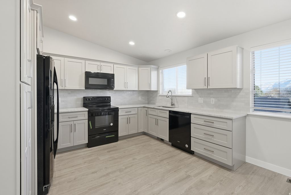 Photo of 5751 S DYNASTY OAKS CIR W, Taylorsville, UT 84118 (MLS # 2128553)