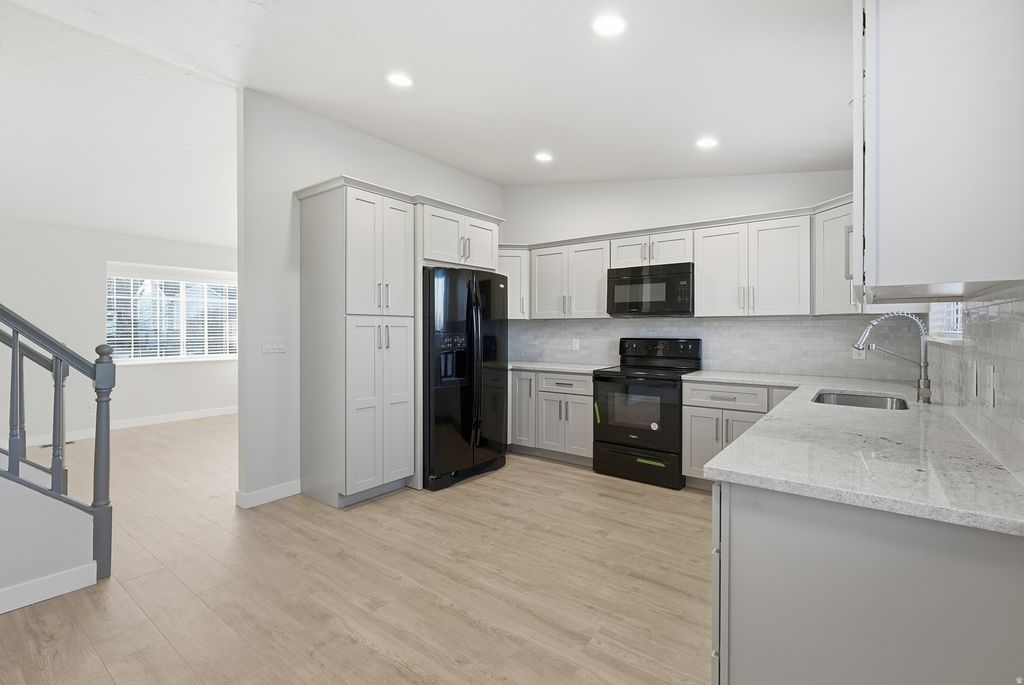 Photo of 5751 S DYNASTY OAKS CIR W, Taylorsville, UT 84118 (MLS # 2128553)