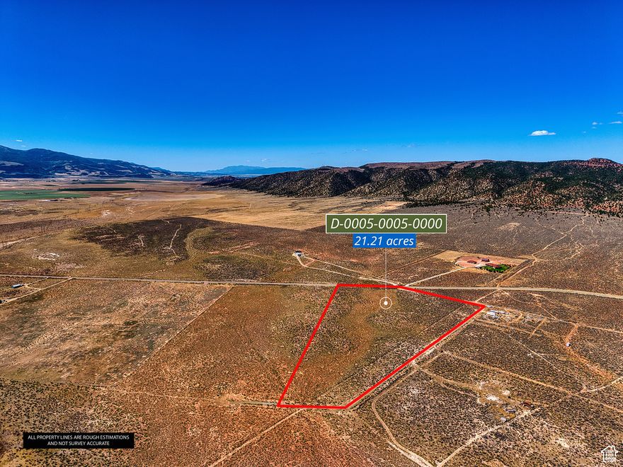 Positioned just east of the western foothills of Iron Valley, this expansive 21.21 acre parcel offers a rare chance to invest, develop, or build your dream estate in a growing area of Parowan. The site is accessible via a combination of asphalt-paved and gravel roads, though there are no curb and gutter systems in place. Utilities are not currently stubbed to the lot, but the area is supported by overhead power, shared/private wells, and septic systems typical for larger undeveloped parcels in this region. This is an ideal location for those seeking flexibility, privacy, and long-term potential just minutes from town amenities and major routes. ** Buyer to do own due diligence regarding any, and all verification of information**