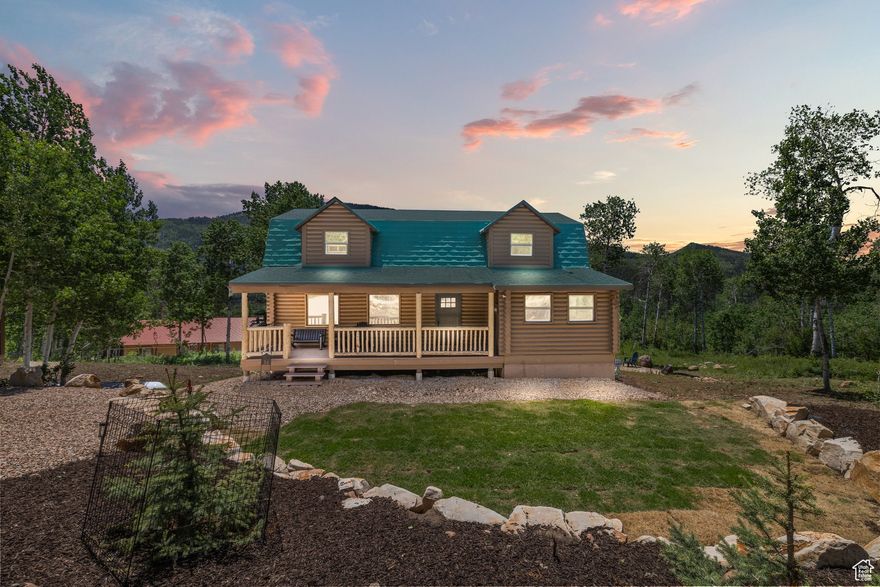 Escape to this expansive 3,072 sq ft cabin, nestled on a serene 0.48-acre lot in Utah's stunning wilderness, just an hour from the Wasatch Front and minutes from the iconic Yellowstone filming locations. With 5 bedrooms and 3 bathrooms, this beautifully updated retreat is perfect for large families, group getaways, or full-time mountain living, blending modern luxury with rustic charm.  Step inside to discover a mountain modern interior featuring: A sprawling game room for endless entertainment A 5.1 surround sound theater room for immersive movie nights A gourmet kitchen with new KitchenAid appliances, leathered granite countertops, and custom cabinetry A convenient kitchenette and dedicated office for work-from-home ease Sonos in-ceiling sound system for seamless ambiance An oversized 2-car garage and fresh landscaping for exceptional curb appeal Recent upgrades include a new furnace, water heater, windows, solid core doors, and more, ensuring year-round comfort and efficiency. The furniture is negotiable, allowing you to move in and start enjoying immediately.