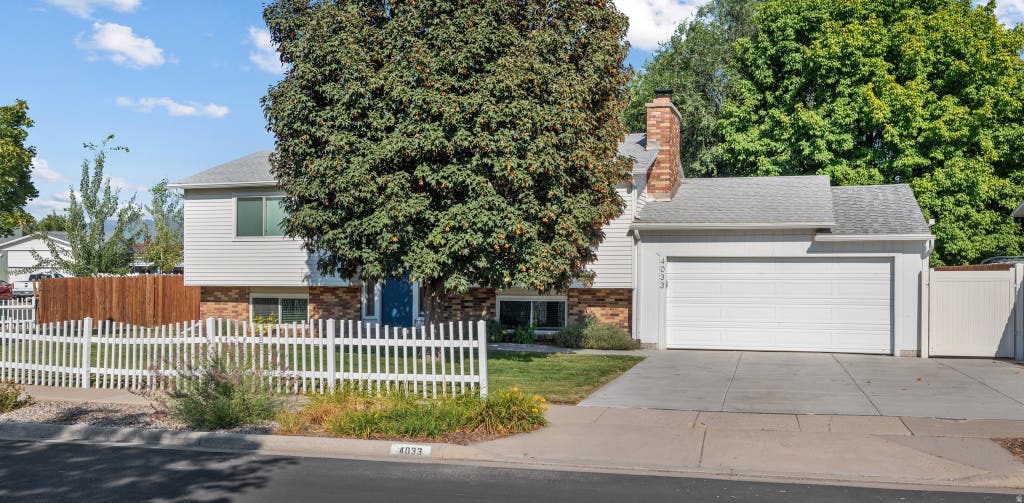 Photo of 4033 S BURNINGHAM DR, Salt Lake City, UT 84119 (MLS # 2176347)