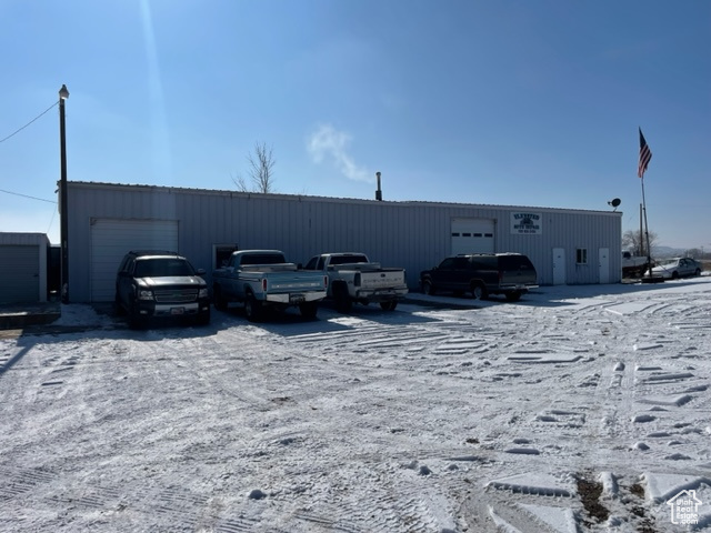 Prime location with great visibility. Currently rented on a month to month lease. Perfect space for retail businesses right on Hwy 40. Two large bays on on the front of the building for auto repair or easy access. There is also two 12x40 foot train storage containers for lots of extra storage. One of the containers can be accessed directly from the interior of the building.  Please no Seller Finance inquiries.  Square footage figures are provided as a courtesy estimate only and were obtained from county records.  Buyer is advised to obtain an independent measurement.