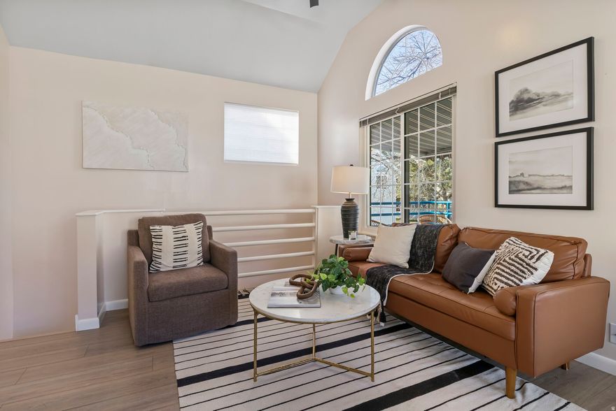 Cute & clean 2 bed, 1 bath condo with 1-car attached garage in a prime Taylorsville location! Convenient mini mudroom upon entering from attached garage or front door then ascend steps to your home's functional layout- great room with vaulted ceilings, lots of natural light. Kitchen, dining, living area with fireplace. Off the kitchen you have an outdoor patio for morning coffee, a perfect spot for potted herbs, or just winding down. Primary bedroom has built-in bookcase, accent ledge, desk space, plenty of natural light from the large window, walk-in closet. Bathroom has double sinks offering space and functionality for an easy daily routine. In-unit washer and dryer included for your convenience. Community features a clubhouse, two pools, spa, tennis court, basketball court, exercise room- giving you resort-style amenities just steps from your door. Included in your HOA dues is water, sewer, trash, snow/ lawn maintenance & cable TV. This unit has no neighbors above or below you. Ideal location, situated near both I-15 and I-215. Walking access to shopping, grocery stores, cinema, restaurants. Close to Riverwalk and other Taylorsville area parks and open spaces. Square footage figures are provided as a courtesy estimate only and were obtained from county records. Buyer is advised to obtain an independent measurement. EXCLUDED are the primary bedroom curtains.