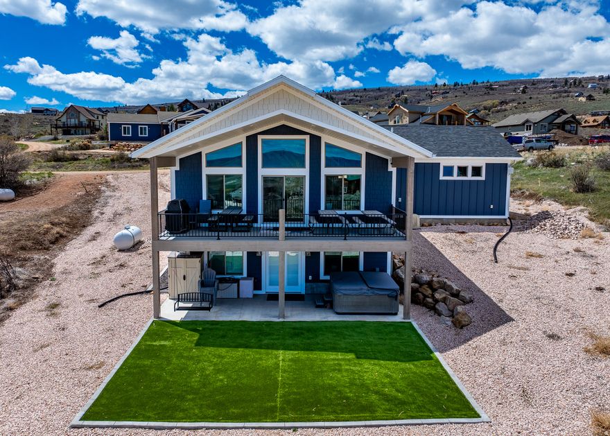 NIGHTLY RENTAL IN BEAUTIFUL BEAR LAKE!  To be sold "Turn Key" stocked and ready to rent or just enjoy year round!! Equipped with 2 water heaters and two washer and dryers!  Relax in the Bullfrog spa or on the covered deck and enjoy the beautiful view of Bear Lake and the mountains and the pleasant summer nights!  Spacious great room and family room perfect for entertaining!  You must see inside!     Square footage figures are provided as a courtesy estimate only .  Buyer is advised to obtain an independent measurement.