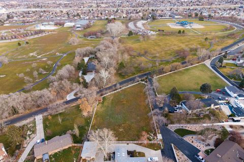 Photo of 5048 S JORDAN CANAL RD, Taylorsville, UT 84129 (MLS # 2131317)