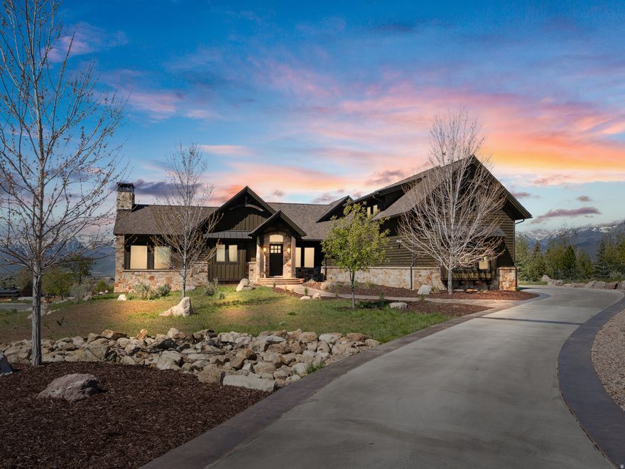 Experience ultimate luxury in this beautifully remodeled 6,400 sq. ft. executive home, designed for seamless entertaining and refined mountain living. This exceptional residence features four oversized bedroom suites and high-end upgrades throughout. The gourmet kitchen showcases Sub-Zero and Wolf appliances, expansive counters, a spacious prep island, and a dramatic oversized backsplash window framing breathtaking Mount Timpanogos views. Recently completed, the brand-new remodel offers sophisticated finishes and a fresh, modern aesthetic. Enjoy premium features including whole-house sound, whole-house humidifier, and thoughtfully designed living spaces ideal for both everyday comfort and entertaining. Situated on a .87-acre cul-de-sac lot, the property includes a dog-friendly backyard with stunning mountain views and an extra-large 3-car garage with ample storage for recreational gear. Located just five minutes from the Red Ledges Golf Course and Club amenities, including the equestrian center, pool complex, pickleball and tennis courts, fitness center, and extensive hiking trails. Owners also enjoy convenient Deer Valley ski access with a shuttle running every 20 minutes. Exclusive perk: This home includes the right to purchase a Red Ledges Golf Membership. A rare opportunity to enjoy luxury, privacy, and year-round recreation with close access to world-class skiing, championship golf, and premier club amenities.