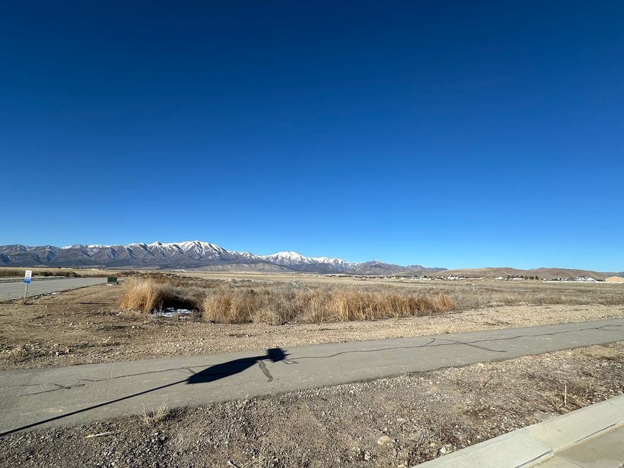 Deer Haven is a special area of large custom lots from 1 acres to 10 acres, located in The Ranches area of Eagle Mountain. Rarely do landowners, real estate developers, neighbors, special interest groups, and government officials collaborate together to create a community as special and unique as this one. Not only is this small yet distinctive community at the crossroads of a major deer migration corridor, it also provides refuge and feeding grounds for pronghorn and native bird populations (including quail, pheasant, and stunningly beautiful raptors), as well as many other smaller, furry, or flying friends! A conservation easement has been put in place to protect these animals and their habitats, affording you the uncommon opportunity to live peacefully among them; preserving their way of life while enjoying a front row seat to observe, commune, and bask in the beauties of nature. Bring your own builder. Other lots are available. Contact agent for more information. Owner/Broker.