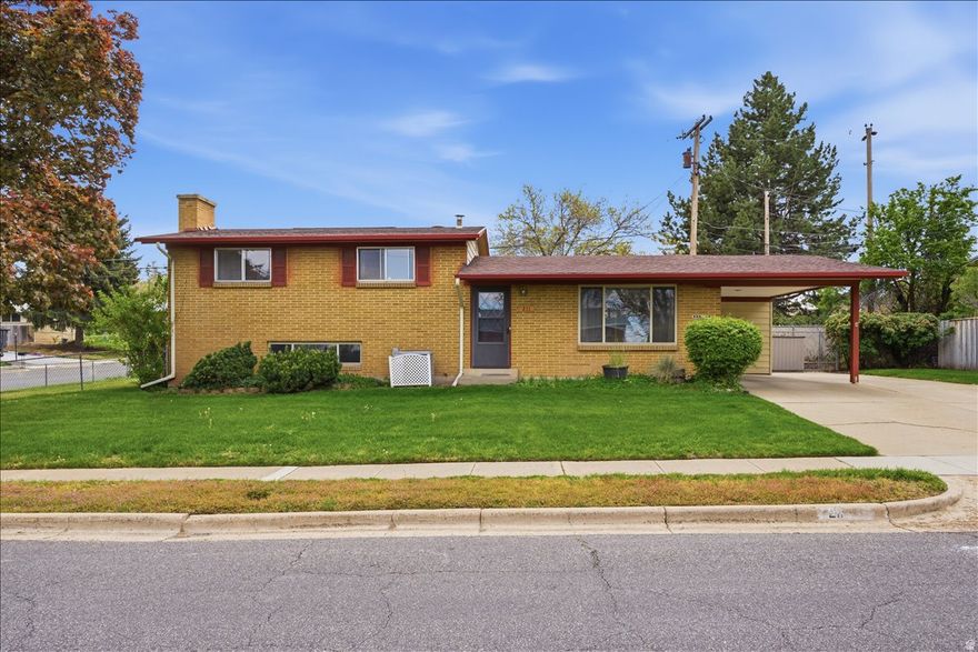 This awesome has been updated throughout! New carpet and tile, updated kitchen with Quartz countertop and all appliances included, beautiful hardwood flooring, spacious bedrooms, updated 3/4 bathroom, 2 big family rooms, over-sized laundry room, walkout basement, new water heater, new furnace, and new roof. Outside you'll find a carport, RV parking, large patio perfect for entertaining, low-maintenance landscaping, and a shed for storage. Sq. footage per tax data records. Property facts provided as a courtesy; Buyer to verify all information.