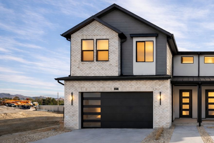 MOVE-IN READY. Brand new TwinHome in Trailside Reserve showcasing the Artisan design package with white cabinetry, matte black hardware, quartz countertops, a modern tile backsplash, and durable LVP flooring throughout the main level. Features include an EV-ready two-car garage and a fully fenced yard. Conveniently located just minutes from shopping, dining, and freeway access. Exceptional builder incentives currently available. Visit the model home at 6760 S 300 E, Midvale, UT. Open Monday through Saturday from 12 PM to 6 PM. Photos may vary by unit.
