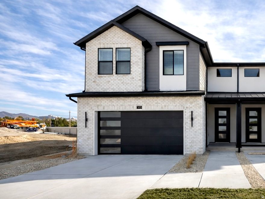 MOVE-IN READY! New East Facing TwinHome in Trailside Reserve featuring the Artisan design package with white cabinets, matte black hardware, quartz counters, stylish tile backsplash, and LVP flooring. EV-ready 2 car garage and fenced yard. Minutes from shops and freeway access. Amazing builder incentives available. Come visit our model home at 6760 S 300 E, Midvale, UT. Open MondaySaturday, 12pm - 6pm. Photos may vary by unit.