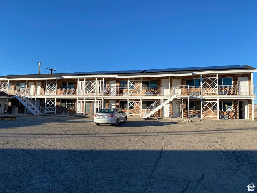 UP for Sale. 17-Plex. Hybrid nightly rental and Long term rental. Solar Panels. Fire suppression sprinkler system. Remodeled rooms. This is a beautiful money making property. It also includes a two level building that could be converted to additional rentals as you grow. Greenriver boasts of incredible desert scenery and is shadowed by the National Arches Park, Goblin Valley, Bookcliffs, Golfing, and of course the awesome winding Greenriver itself.    Square footage figures are provided as a courtesy estimate only and were obtained from _County Records.  Buyer is advised to obtain an independent measurement.