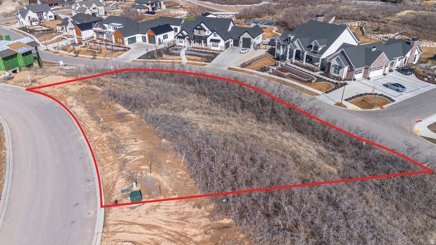 Stunning mountain, valley, and possibly lake views from this building lot surrounded by homes valued $1.8M - $5.3M. Rare opportunity w/double access from roads above & below property. No adjoining backyard neighbor. Possible panoramic rooftop deck views. Sellers are willing to include draft architectural plans for beautiful custom modern home designed for this lot by Beecher/Walker Architects for strong offers.