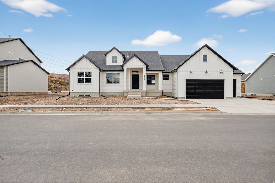 This gorgeous rambler has ALL the bells and whistles. From the stunning farmhouse exterior to the spacious interior layout, filled with natural light and elegant finishes. The heart of the home is the gourmet kitchen, where culinary dreams come to life. With high-end appliances, stylish cabinetry, huge pantry, it's a chef's paradise. This property boasts a full finished basement with 3 large bedrooms, tons of storage and hidden bunker room, offering endless possibilities for additional living space or recreation. HUGE garage and No HOA. Located in South Weber on a .30 acre lot, plenty of room for all your toys. You'll experience the best of both worlds - the tranquility of suburban living with easy access to urban conveniences. Don't miss your chance to make this house your home! Call to schedule a tour and discover the perfect blend of comfort, style, and community.  We are offering some INCREDIBLE incentives on this home, ask for details and don't wait to see this one!