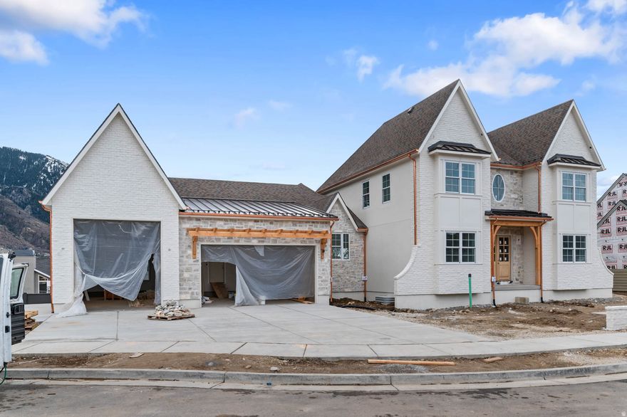 Brand New Luxury Custom Home in The Orchards at Dimple Dell. Located in this exclusive new subdivision featuring multiple 2026 Parade Homes, this thoughtfully designed 6,365 sq ft home offers 6 bedrooms, 4.5 bathrooms, and an oversized 1,335 sq ft 3-car garage with additional RV parking. High-end finishes throughout include engineered hardwood floors, 8' solid core doors, white oak cabinetry, custom built-ins (including library), butler's pantry, and a spacious main floor office. Enjoy unobstructed mountain views from the waterproof deck. Additional features include 4 fireplaces, a theater room, spacious basement recreation area, and a dedicated exercise space. The home also includes a sauna, cold plunge, in-ground hot tub, and a fully landscaped yard with an outdoor fire-pit. A rare opportunity in one of the area's most sought-after communities. It's a MUST SEE!