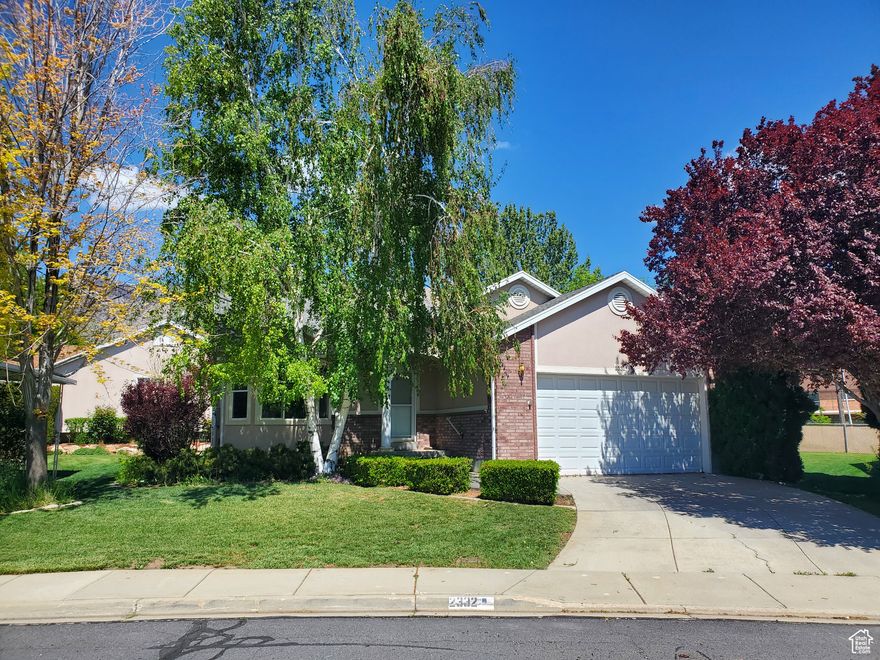 Best Value within this favored 55+ community located in the heart of North Ogden! This home includes the simplicity of main floor living, including easy access without stairs to all your necessary amenities!  As an added bonus, there is a full basement with a separate entrance giving you an additional living space and a lot more storage. Enjoy piece of mind knowing there is a new roof and HVAC system as well as all the details for lawn care and snow removal are handled by the HOA! The owner just installed beautiful new carpeting on both levels and LVP flooring in two of the bath rooms. This home's open floor plan includes a large living area with big windows, plantation shutters, vaulted ceilings and two cozy gas fireplaces. The primary bedroom includes a walk-in closet as well as easy access to a step-in shower! The kitchen is well appointed including a gas range, plenty of cabinets, storage, counter top and dining space. All appliances including the washer and dryer will stay and convey to the new buyer. Come see this amazing home with its beautiful trees, lush landscape and Mountain views! Exceptionally cared for and ready for your private showing. Call to schedule today!