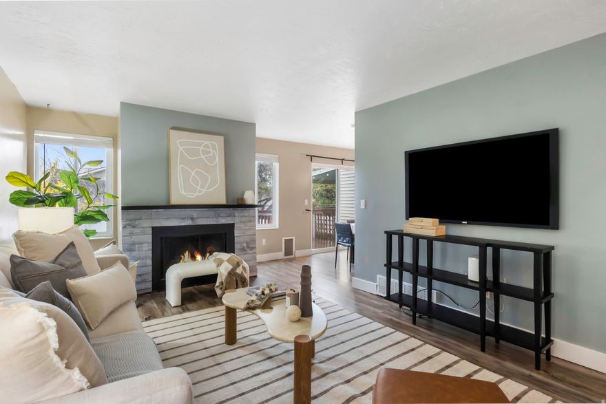 *OPEN HOUSE SATURDAY 4/11 11-1*  Updated 4-bedroom townhouse with a finished basement, fenced backyard, and 2-car garage - features that are hard to find at this price point in Sandy! This functional layout has multiple living spaces, including a finished basement featuring a second living room,  4th bedroom and spacious full bath, plus a large finished storage room. Kitchen and bathrooms have already been updated, and major systems are taken care of with newer central A/C, a tankless water heater, and a whole-home water filtration system. Outdoor living space galore with a fully fenced backyard  and patio (complete with string lights!). Prime location close to shopping, restaurants, and parks plus easy access to I-15.