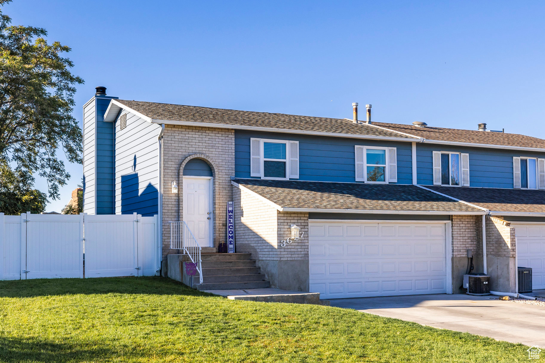 Welcome to this charming 3-bedroom, 2-bath twin home in Roy! Come see why this one stands out above the rest. Freshly painted and move-in ready, this home offers a bright and welcoming feel throughout. You'll love the functional layout, comfortable living spaces, and the nicely kept yard, perfect for relaxing, gardening, or entertaining. This home features a custom office space, currently used as a bedroom, and a finished den on the main level that add to this amazing home's living space. Recent updates add extra peace of mind, including a new HVAC system and water heater (2018), kitchen updates over the last year, and a new fence and sprinklers installed in 2019. With a great location close to schools, parks, and shopping, this home perfectly combines modern updates, convenience, and cozy charm.