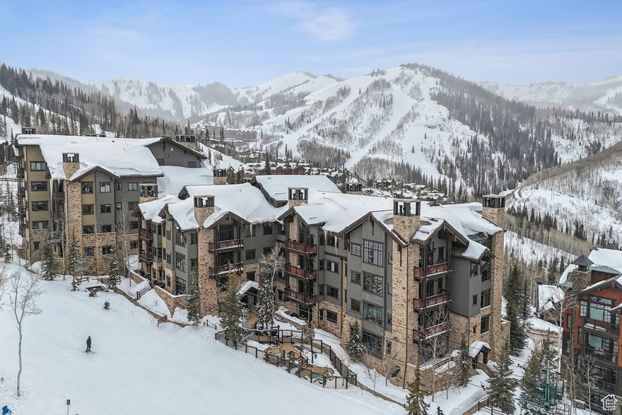 This 2-bedroom, 2.5-bath Arrowleaf condo offers direct ski-in/ski-out access to Deer Valley's Silver Buck run and Silver Strike Express lift. The open living area features a stone fireplace, reclaimed hardwood floors, and south-facing views that fill the space with natural light.  The kitchen includes Wolf and Sub-Zero appliances, while both bedrooms have private ensuite baths. Arrowleaf amenities include a ski locker room, lounge, fire pits, hot tubs, heated garage parking, and a private shuttle service.  Perfect as a mountain getaway or rental property, this slopeside retreat offers easy access to world-class skiing and year-round adventure.