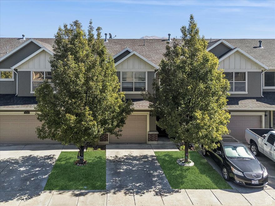 Welcome home to this beautifully maintained townhome featuring fresh paint, newer LVP flooring, and brand-new carpet- completely move-in ready! The open layout includes 2 spacious bedrooms, 2 full bathrooms, and a well-appointed kitchen with stainless steel appliances and a breakfast island. Enjoy the convenience of a one-car garage and low-maintenance living in a quiet, friendly neighborhood. Take advantage of nearby walking paths that connect to the Weber River Trail, plus parks and playgrounds just steps away. This home combines comfort, convenience, and a great location-ready for you to move right in!